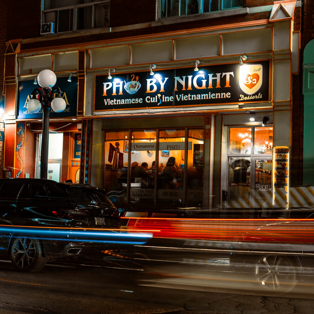 Pho By Night storefront at night